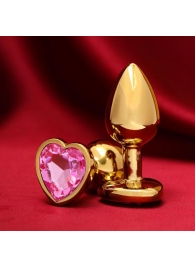 Золотистая анальная пробка с розовым кристаллом в форме сердца - 7 см. - Сима-Ленд