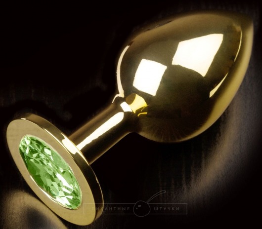 Золотистая анальная пробка с салатовым кристаллом - 9 см. - Пикантные штучки - купить с доставкой в Нижнем Новгороде