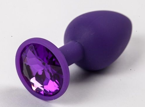 Фиолетовая силиконовая анальная пробка с фиолетовым стразом - 7,1 см. - 4sexdreaM - купить с доставкой в Нижнем Новгороде