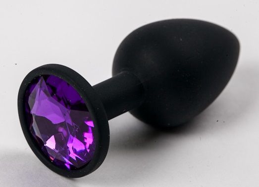 Черная силиконовая анальная пробка с фиолетовым стразом - 7,1 см. - 4sexdreaM - купить с доставкой в Нижнем Новгороде